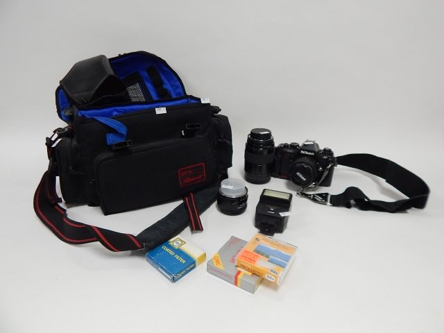 N 2020 NIKON CAMERA: WITH EXTRA LENSES, PARTS, AND BAG. FROM ESTATE CONDITION AS FOUND