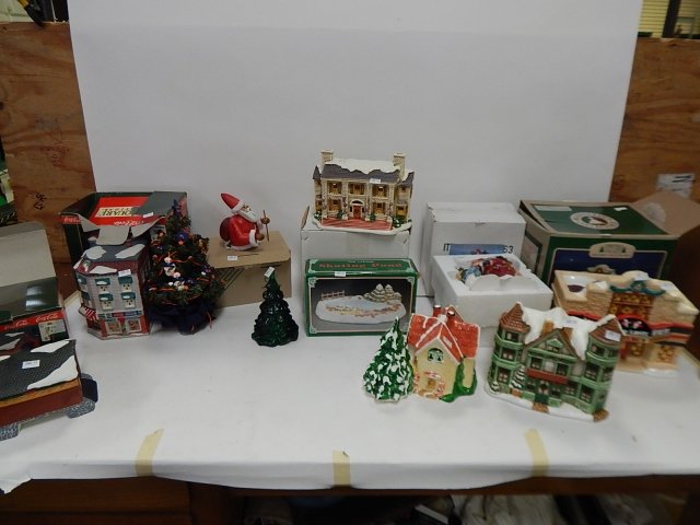 CHRISTMAS VILLAGE AND ORNAMENTS: COCA COLA TOWN, SKATING POND, BOWLING ALLEY, SANTA FIGURINES, AND MORE. BOXES ARE ROUGH.
