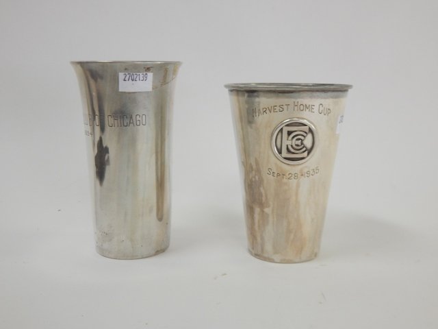 TWO STERLING SILVER CUPS: HAND WROUGHT. C.D. PEACOCKS AND WALLACE. 9.9 OZ. TALLEST IS 5 1/2".