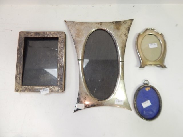 FOUR STERLING SILVER PICTURE FRAMES: LARGEST IS 10".