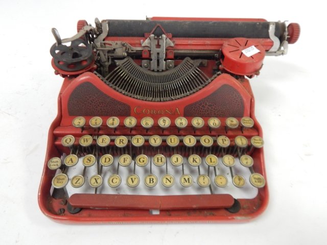 CORONA TYPEWRITER: 10" WIDE X 12" DEEP AND 4 1/2" TALL. SPACE BAR IS BROKEN.