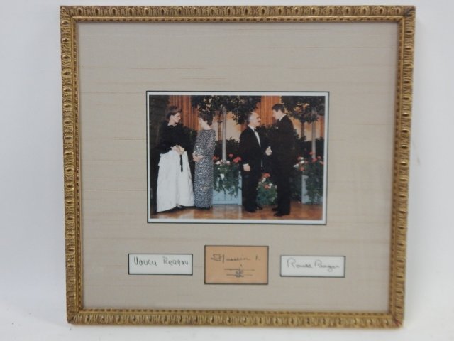 RONALD AND NANCY REAGAN WITH KING HUSSAIN: AUTOGRAPHED RECEPTION PHOTO.