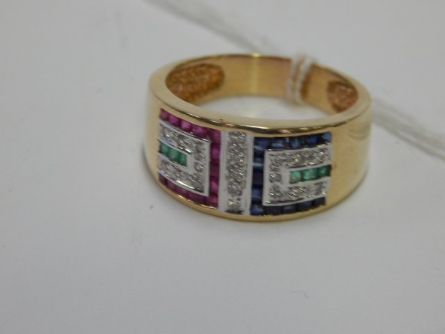 10 K GOLD RING WITH RUBY, EMERALD, DIAMOND CHIPS: SIZE 10 UNUSUAL SETTING.