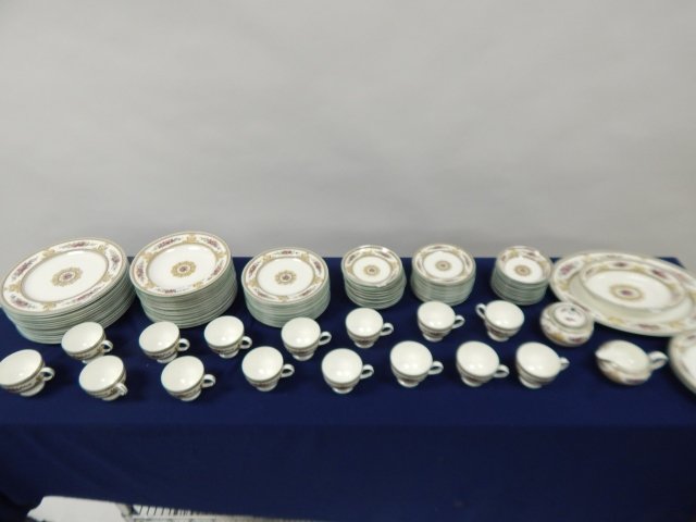 WEDGEWOOD BONE CHINA DISHES COLUMBIA 595: 14 DINNER PLATES, 16 BOWLS, 14 LUNCHEON PLATES, 12 SAUCERS, 14 SMALL PLATES, 13 SMALL BOWLS, 15 CUPS, LARGE PLATTER, AND THREE SERVING BOWLS WITH CREAMER. CONDITION IS GOOD.