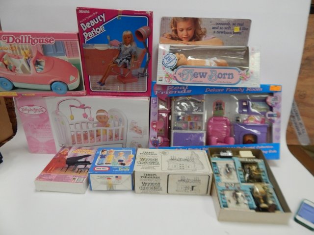 LOT OF MISC. DOLLS AND TOYS: DOLL AND CRIB, BEAUTY PARLOR, FAMILY ROOM, CAR, NEW BORN DOLL AND DOLL FURNITURE.