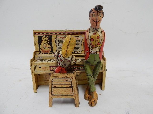 DOG PATCH FOUR WIND UP PIANO TOY. (1 of 5)