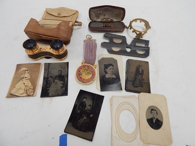 OPERA GLASSES IN CASE: WITH EYE GLASSES, DECORATIVE WATCH, AND ASSORTED PHOTOS.