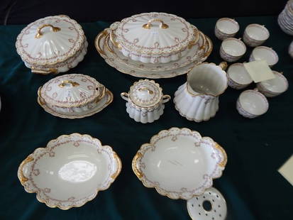 HAVILAND LIMOGES SET OF DISHES: 10 dinner plates, 10 luncheon plates, 12 fruit plates, 12 soup bowls, 11 large soup bowls, 12 bone dishes, 12 salts, 12 cups, 11 2 handled cups, 7 coffee cups, 4 serving trays, 4 celery dishes, gravy