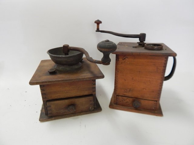 TWO COFFEE GRINDERS: LARGEST IS 7 AND 1/2" TALL, 6 AND 1/2 LONG.