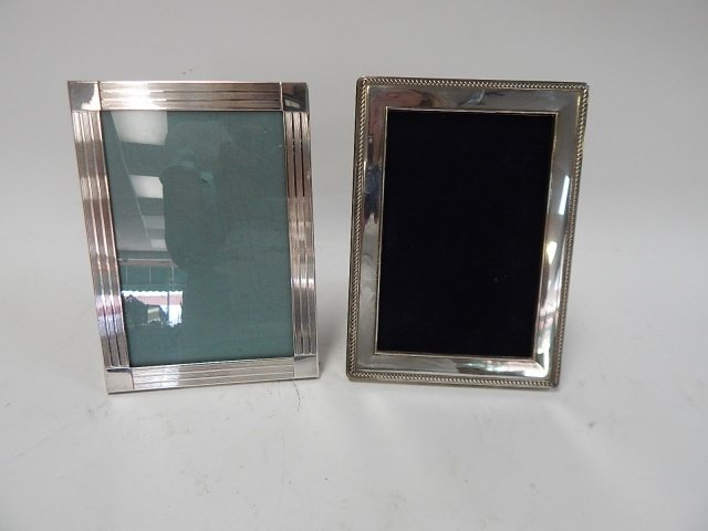 TWO STERLING PICTURE FRAMES: ONE 925. ONE IS MARKED TIFFANY & CO. 5" BY 7"