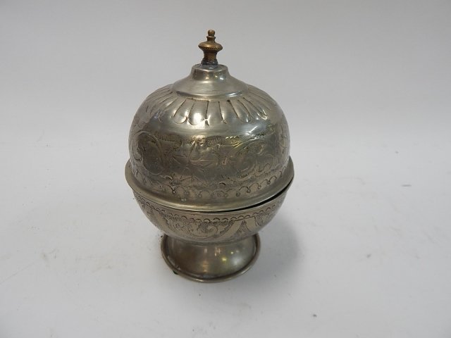 MIDDLE EASTERN TIN COVERED JAR: NO MARKS. 7 AND 1/2" TALL.