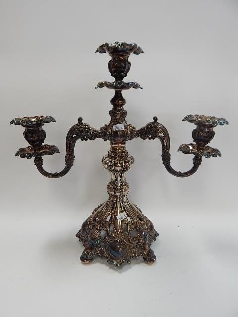 REED AND BARTON THREE ARM CANDELABRA: ORNATE 16 INCH TALL SIGNED BARTON & REED SILVER PLATE CANDLELABRA. GOOD CONDITION.
