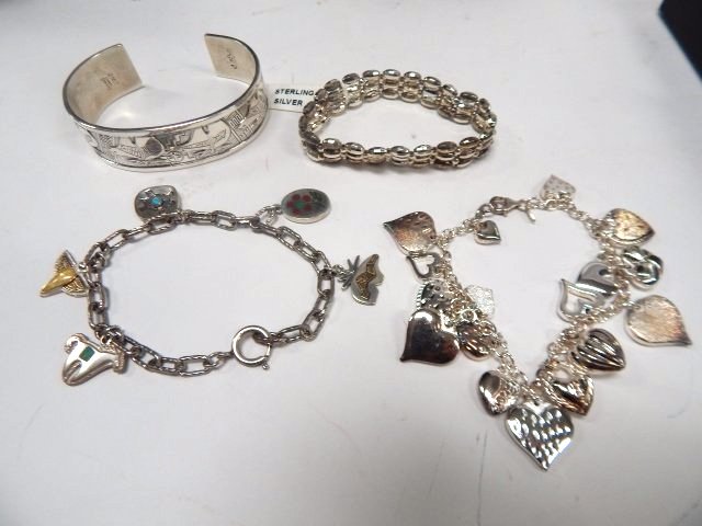 FOUR STERLING SILVER BRACELETS (1 of 1)
