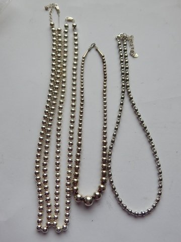 FOUR STERLING SILVER NECKLACES (1 of 2)