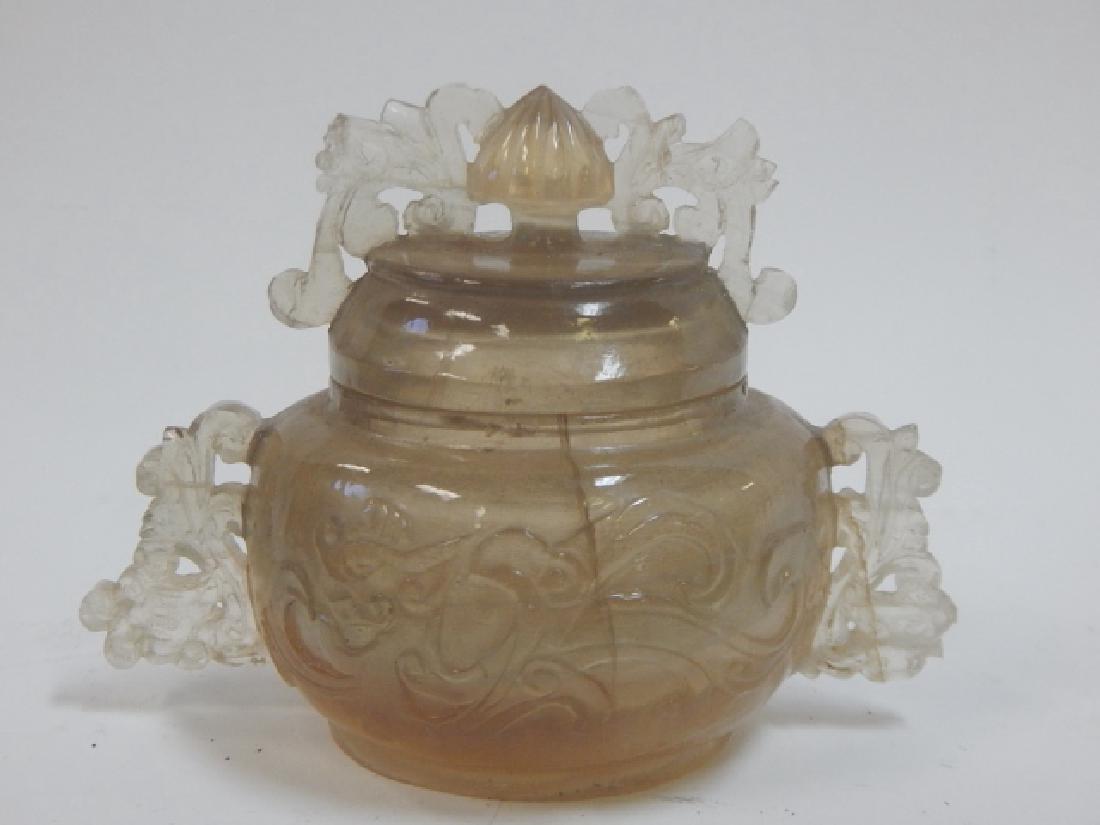 JADE ROCK CRYSTAL INCENSE: 3 AND 3/4" TALL, 5" LONG. ROCK CRYSTAL JADE INSENT, CRACKS IN BODY. BREAK ON HANDLES AND CHIPS. DISCOLORATION IN BASE