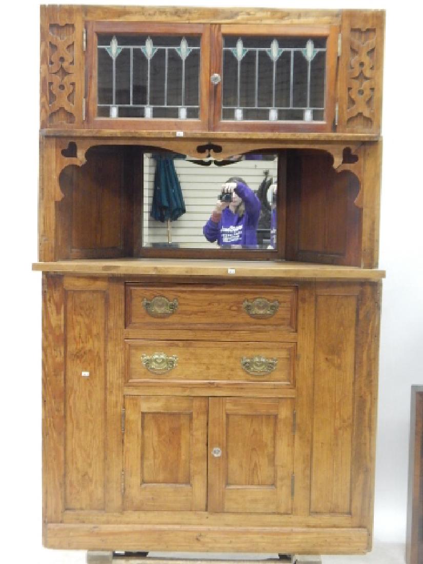 PINE CORNER CABINET: 70" TALL, 44 AND 1/2" LONG, 17" DEEP. TWO PIECES. LEADED GLASS DOORS STORAGE ON BOTTOM CLEAN FINISH