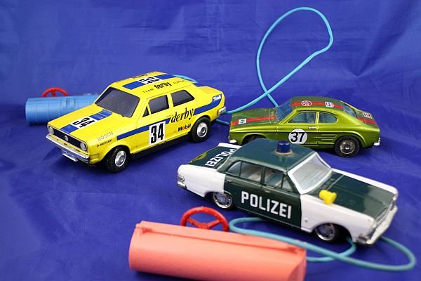2x ASAHI – 1x SSS Toys – 3 tin models: Police Car with battery motor ( 21cm) – Asahi VW Polo 22cm ) with battery motor – Ford Capri ( 19cm ) – cutten battery motor