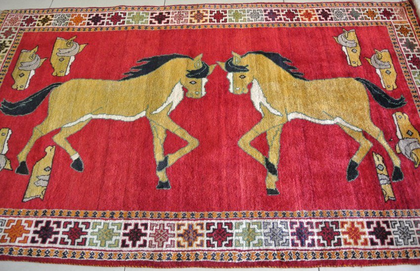 Persian pictorial rus Gabbeh sierra of Arabian horse: Persian carpet hand made Gabbeh decpiction image of horse and it refrections design is single mirror image. WR1088-C Size 4'x6.10' Condition : Excellent antique no known damage