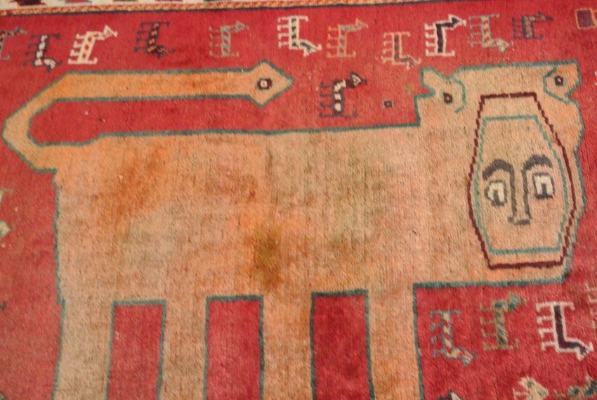 Persian gabbeh hand made rug Pictorial Lion carpet: Lion carpet hand made buy Qasghqai tribes of Iran Size 3.2'X5.1'WR-0884-C Condition: Bleeding red color in one side, both ends are intact, Low pile Age: Circa 1920's
