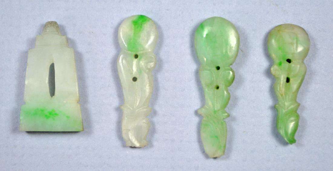 CHINESE ANTIQUE CARVED GREEN JADE BUTTONS, MANDARIN: A very fine Chinese collection of four antique carved jade mandarin court buttons. Approx 25 mm length each. Excellent condition. Provenance: Private collection, Los Angeles.