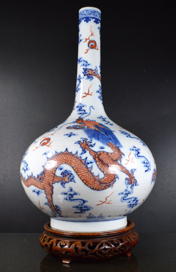 CHINESE QING LONG NECK UNDERGLAZE PORCELAIN VASE: A Chinese qing long neck underglaze porcelain vase, decorated with dragon, and ruyi clouds, with marks at the base, probably 19th century, very good quality, exc cond