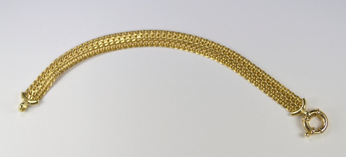 BRACELET 14 KT GOLD: A Bracelet, 14 KT yellow gold, 7 inches long, 3/8 inch wide, Milor Italy HM, 8.4 gr, slight bend to wire mesh, but good cond.