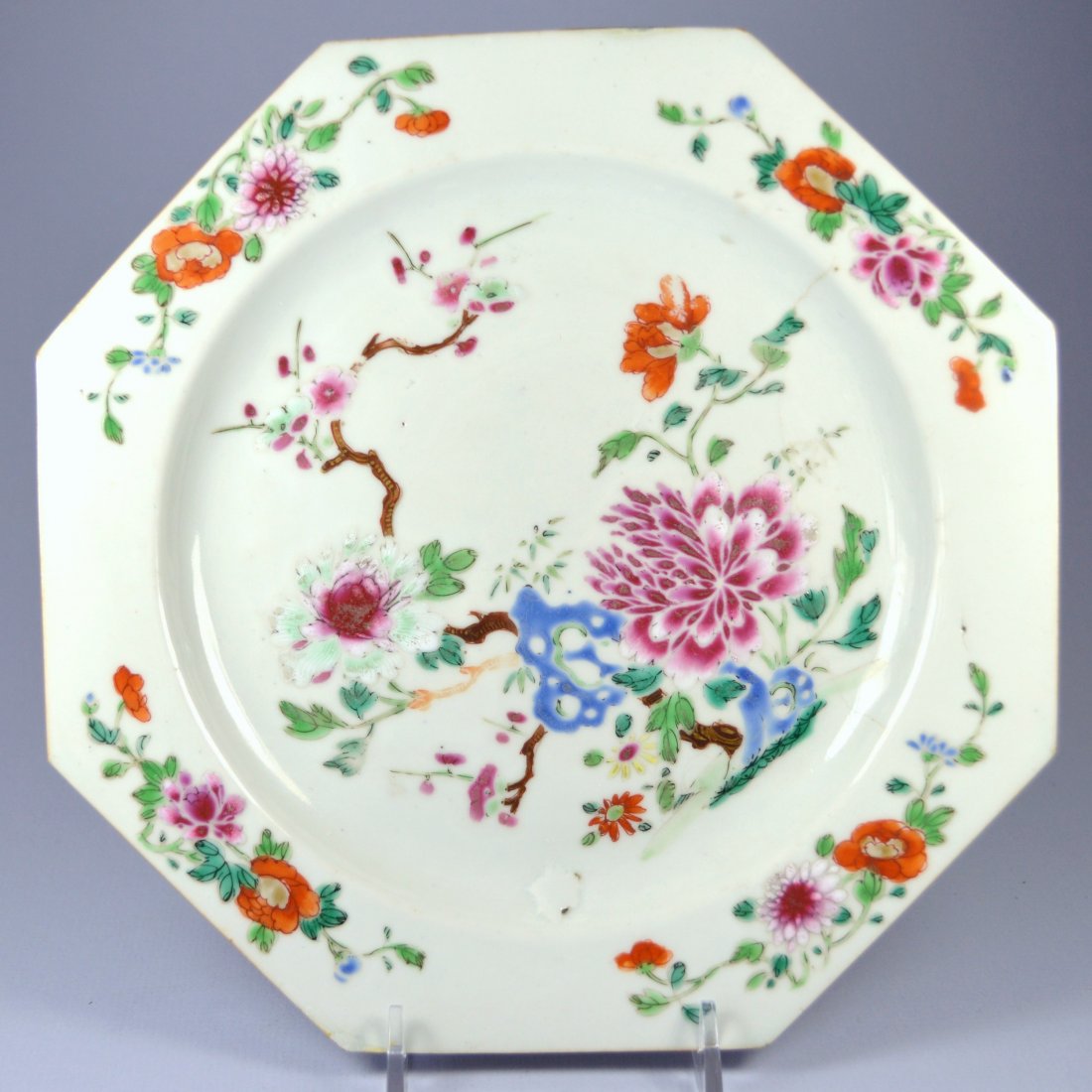 CHINESE QIANLONG OCTAGONAL PORC PLATE 18TH C: A large Chinese Qianlong octagonal porcelain plate with floral decoration, circa 1780. Excellent condition, other than two small areas of professional touch up inside. 9 inches in diameter. Provenance