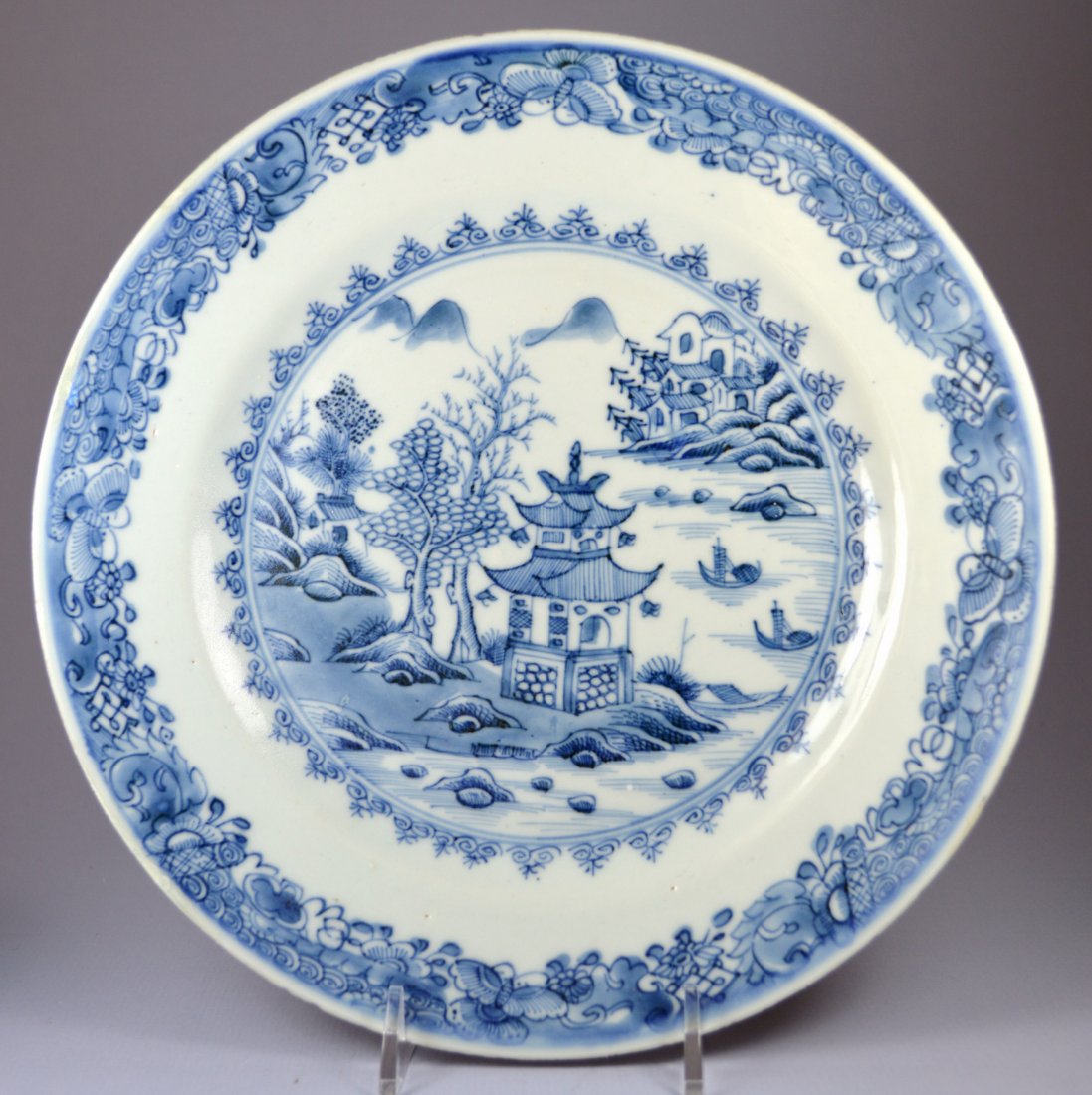 CHINESE QIANLONG PORCELAIN LANDSCAPE PLATE CA 1780: A stunning Chinese Qianlong blue on white underglaze plate. Decorated with a river landscape, dia: 9 inches. Excellent condition, a few minor nicks around the rim. Provenance: Private collection, Manc