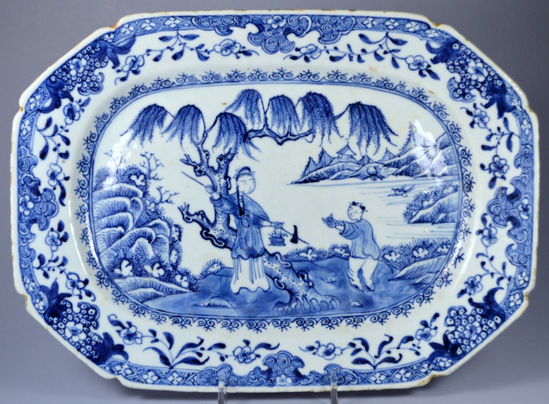 CHINESE QIANLONG OCTAGONAL PORC PLATTER: A stunning large Chinese Qianlong blue on white underglaze porcelain platter ca. 1770's. Decorated with figures by a river landscape. Size 31 x22 cm. Excellent condition, a few minor frits and fleabit