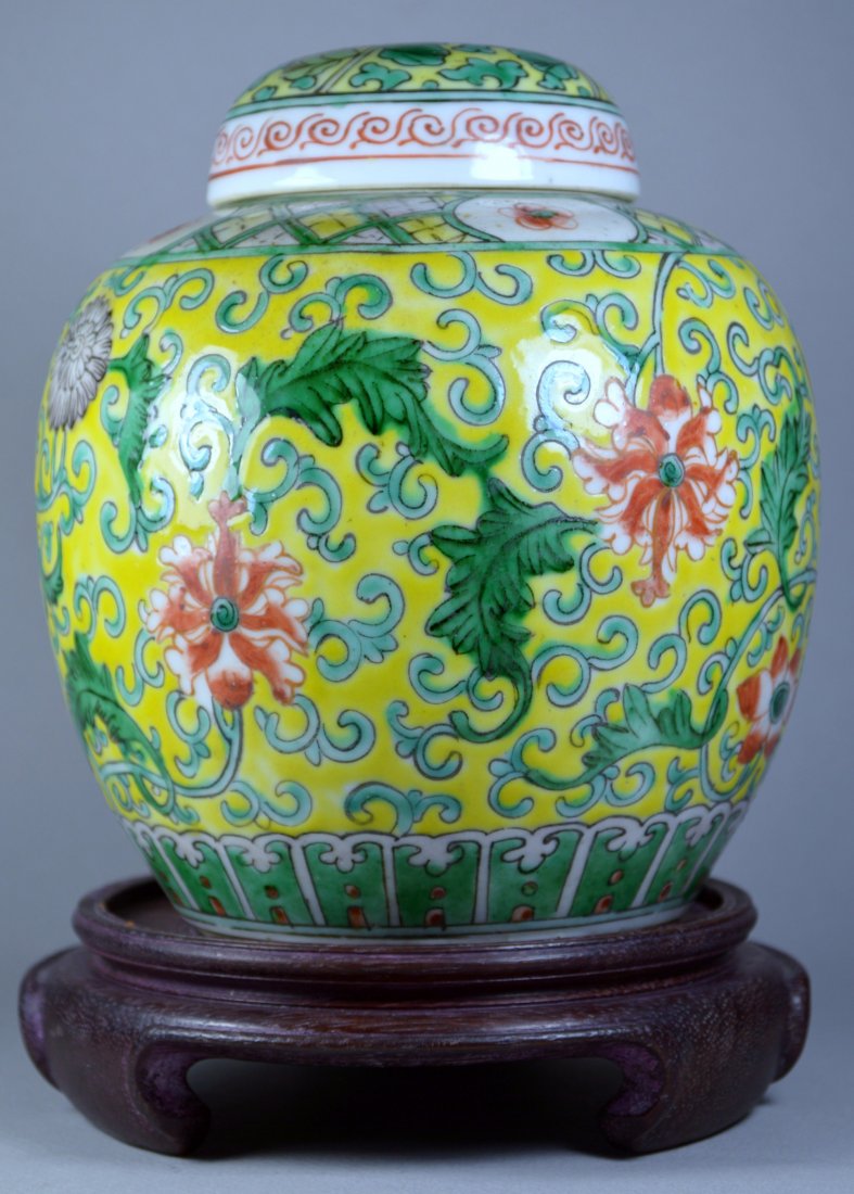 CHINESE WU-CAI YELLOW GINGER JAR CA.19TH C: A stunning Wu-Cai style Chinese porcelain ginger jar decorated with lotus and tendrils, over a yellow background with lid. Circa 18th-19th C. 5.5 inches in height, excellent condition. Provenance: A B