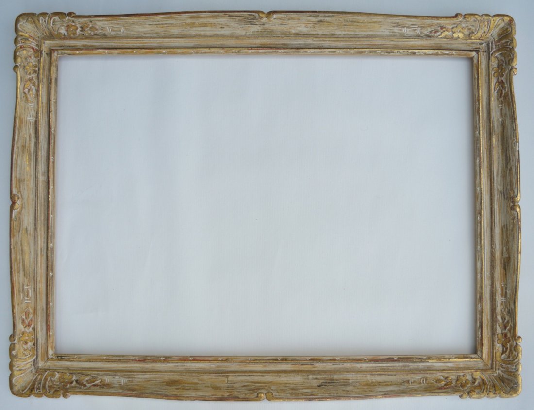 NEWCOMB MACKLIN FRAME: A whitewashed, gilt, carved Newcomb-Macklin period frame. Rabbet size: 20.25 X 28.25 , W: 2.75 inches, inches, good condition.