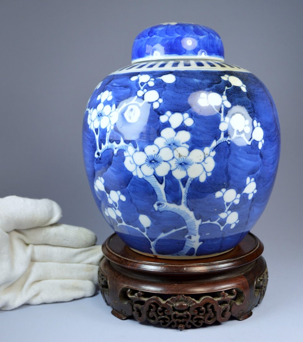 CHINESE PORC LIDDED GINGER JAR CA.19TH C: A Chinese blue on white underglaze porcelain lidded ginger jar ca 19th c. Decorated with prunus design, double ring marks at the bottom, a very attractive piece in excellent condition. Size height:19