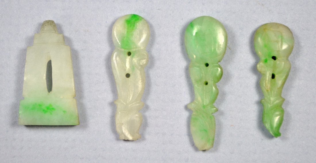 CHINESE ANTIQUE MANDARIN COURT JADE BUTTONS: A set of Chinese antique carved jade Mandarin court buttons. Sizes from . Altogether 4 of them. Sizes 25 to 42 mm.
