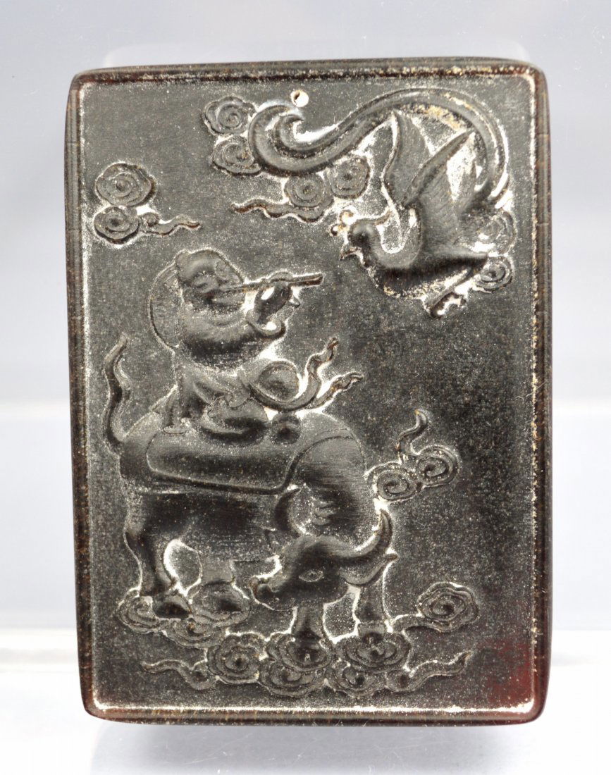 CHINESE CARVED PENDANT POSSIBLE RHINOCEROS HORN: An amazing Chinese carved rhinoceros horn amulet pendant with water buffalo and scholar. 48 gr, 70 x 50 x 11 mm. Exc cond. Provenance: Private collection, Zurich, Switzerland.