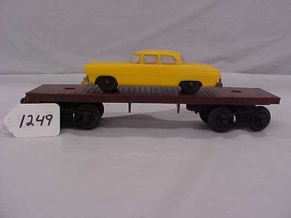 Lionel Flatcar w/yellow automobile