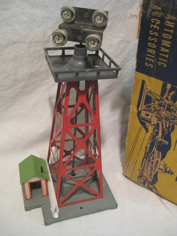 774 Floodlight Tower: light rust, paint flaking on tower