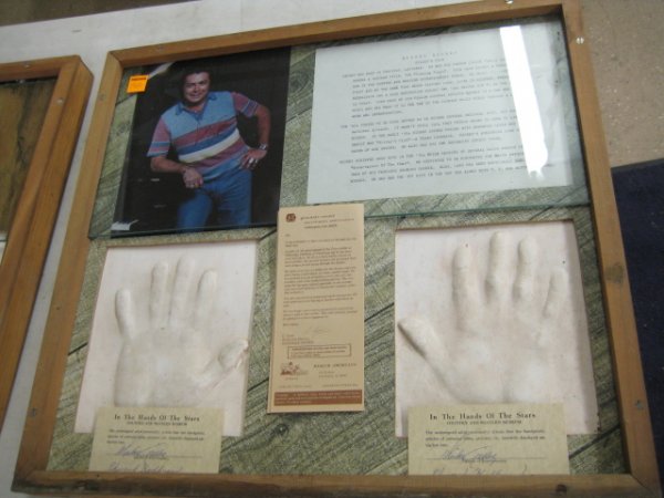 Mickey Gilley Framed Hand Prints with autograph V: Mickey Gilley Framed Hand Prints with 2 autographed certificates, autographed Photo and a flyer All of the hand prints came from the estate of Ed Huffman who had a traveling museum called "Museum Amer