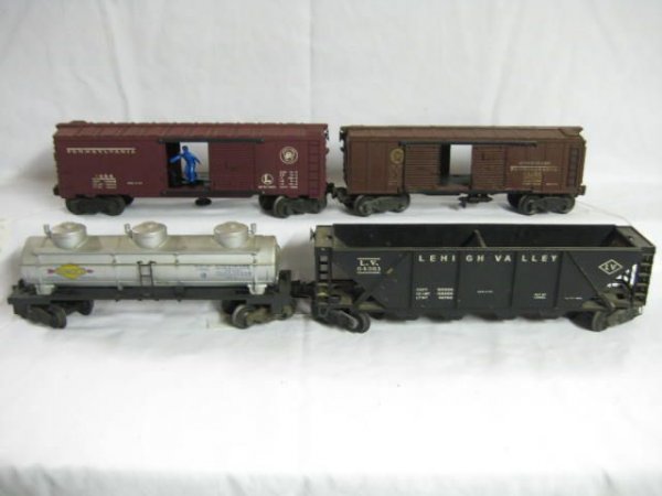 4 cars: 3484 Pennsylvania E; 6463 Black Hopper E; 6415 3 Dome tank E; 2758 Box car VG