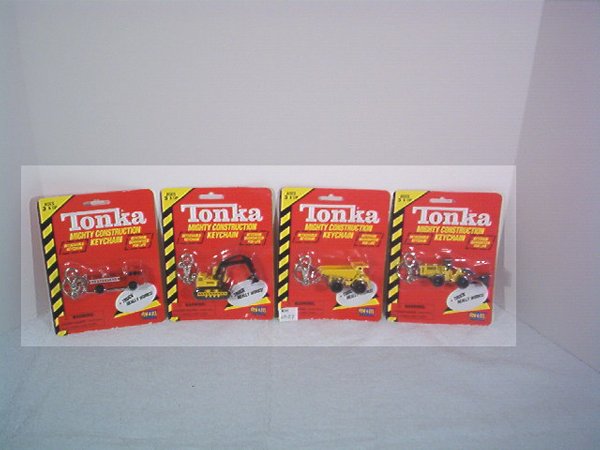 Tonka Mighty construction Key chain: Tonka Mighty construction Key chain Set of 4, Key chains are diecast, Set includes loader, dump truck trac-hoe, fire truck