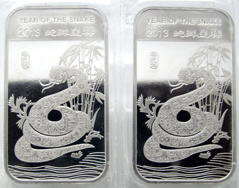 2-Bar Set: 2013 Year of the Snake .999 Silver Bars: 2-Bar Set Includes: 2013 1 Oz Year of the Snake .999 Fine Silver Bars.
