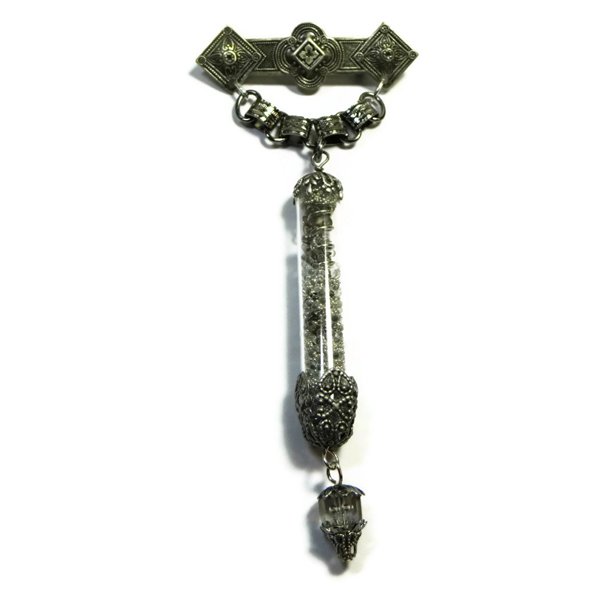 Steampunk Pin Medal in Antiqued Silver Plated Brass: Steampunk Pin Medal in antiqued silver plated brass with filigree bead caps, glass beads and gears in glass tube. All hanging from book chain attached to a NOS vintage find bar pin with locking c clas