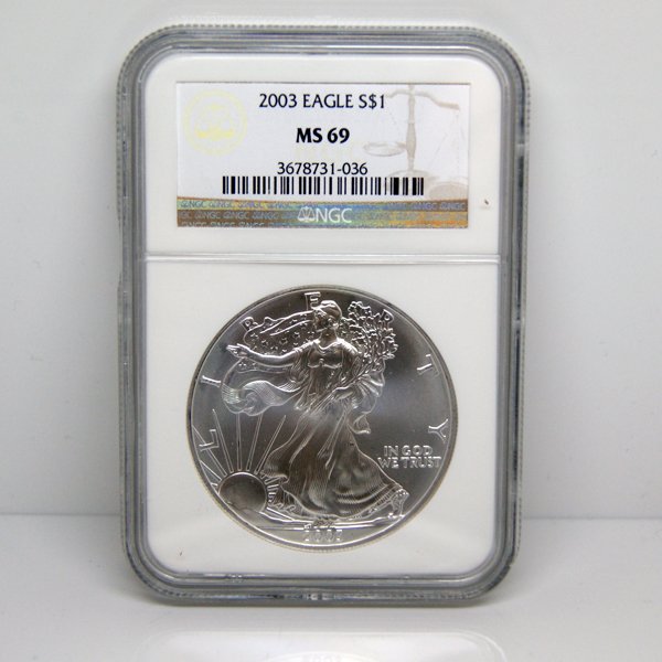 2003 Silver Eagle MS69 NGC - Brown Label: 2003 MS69 NGC Brown Label Silver American Eagle Bullion Coin by The United States Mint. The Silver Eagle Coin Has a Legal Tender Value of $1 and Contains 1 Oz of .999 Fine Silver.