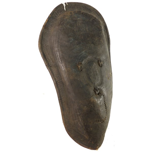 Early 1900's Cultural Tribal Warrior Shield: Early 1900's Authentic Cultural Tribal Warrior Shield from Zambian - Leather over solid wood - Dimensions: 28.5" H x 16" W SHIPPING - Free shipping. - Actual picture. RETURN AND EXCHANGE POLICY - All 