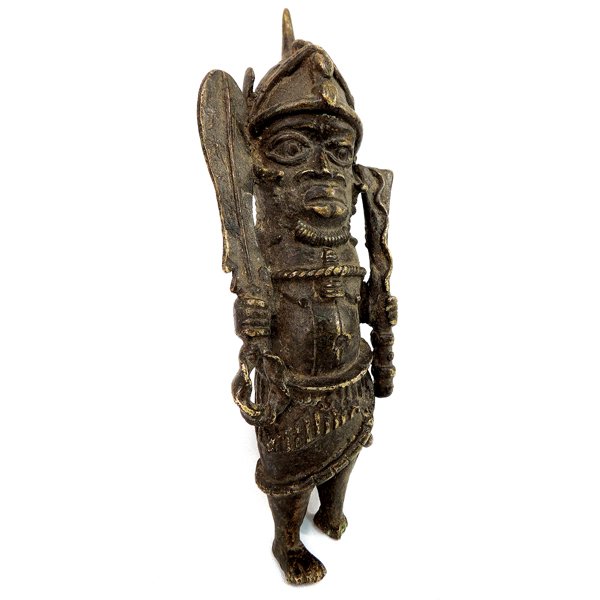 Early 1900's Cultural Tribal Brass Warrior Figure: Early 1900's Authentic Cultural Tribal Brass Warrior Figure from Togo - Brass - Dimensions: 9.5" H x 3.5" W SHIPPING - Free shipping. - Actual picture. RETURN AND EXCHANGE POLICY - All sales are final