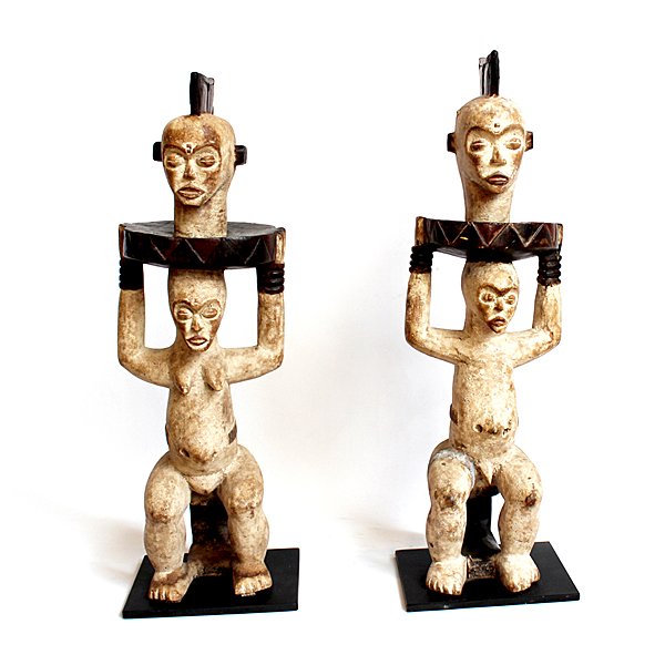 Early 1900's Cultural Tribal Wooden Pair of Figures: Early 1900's Authentic Cultural Tribal Carved Wood Pair of Figures from Sudan - Sold as Pair. - Dimensions: 24" H x 8" W x 8" D SHIPPING - Free shipping. - Actual picture. RETURN AND EXCHANGE POLICY -