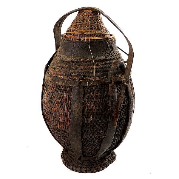 Early 1900's Cultural Tribal Leather Water Jug: Early 1900's Authentic Cultural Tribal Leather Water Jug from Zimbabwe - Leather and Natural Fibers - Dimensions: 7.5 Diam., 13" H SHIPPING - Free shipping. - Actual picture. RETURN AND EXCHANGE POLIC