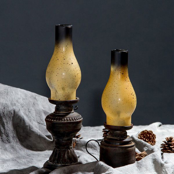 Miniature Vintage Kerosene Lamps Set of 2 12.7": Miniature Vintage Kerosene Lamps - Sold as pair - Resin - Dimensions: - Large 7" Diam., 12.7" H - Small 6" Diam., 10.3" H SHIPPING - Free shipping. - Most orders ship within 15-25 business days of pur