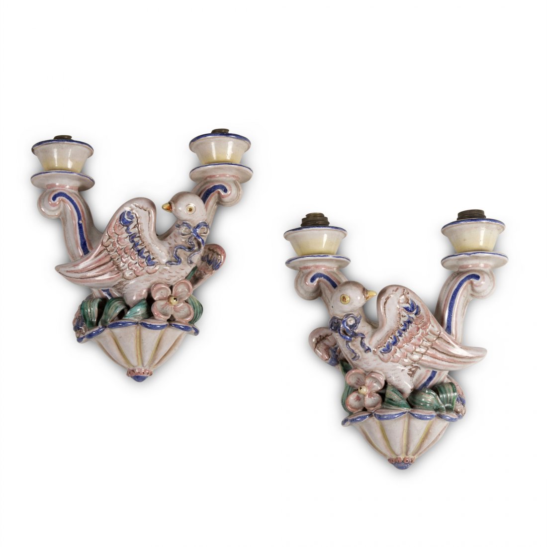 Jugenstil Wall Sconces, Pair: Pair of ceramic bird two arm wall sconces, elaborate form and colors, glazed and molded with foliage. Austrian or German, 1900-1910. Overall height 8 in, width 7 in.