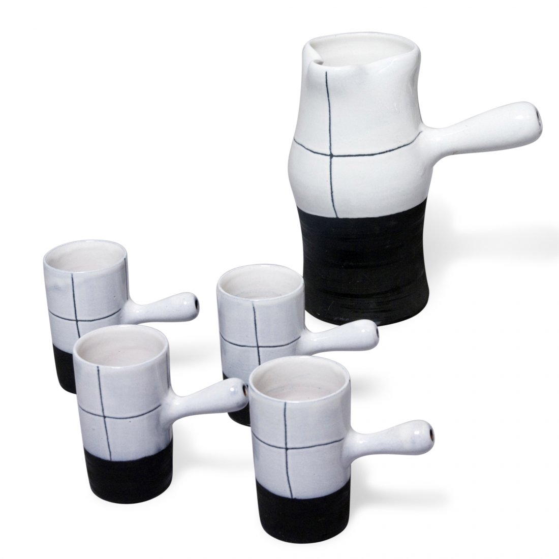 Jacques Innocenti Mocha Set: Five piece coffee or mocha service, a handled pitcher and four handled cups, each of white ceramic with black sgraffito markings and black lower half. By Jacques Innocenti, French 1950s. Signed to und