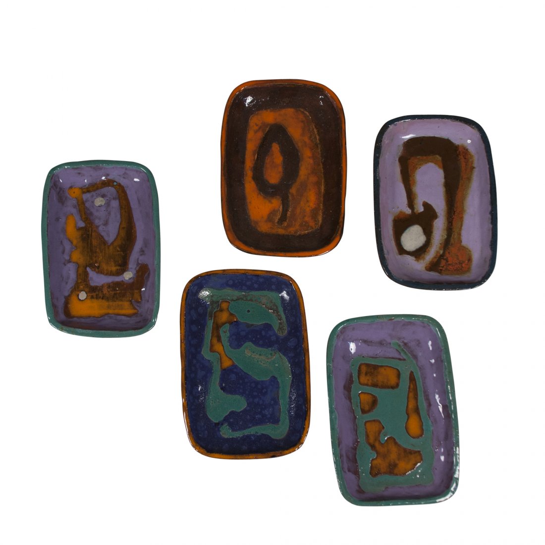 Hand Painted Ceramics by Juliette Derel, Set of Five: Set of five glazed hand-painted ceramic platters, in various colors, rectangular shape with rounded corners, raised edges, by Juliette Derel, French late 20th century. Signed to backside, and retainin